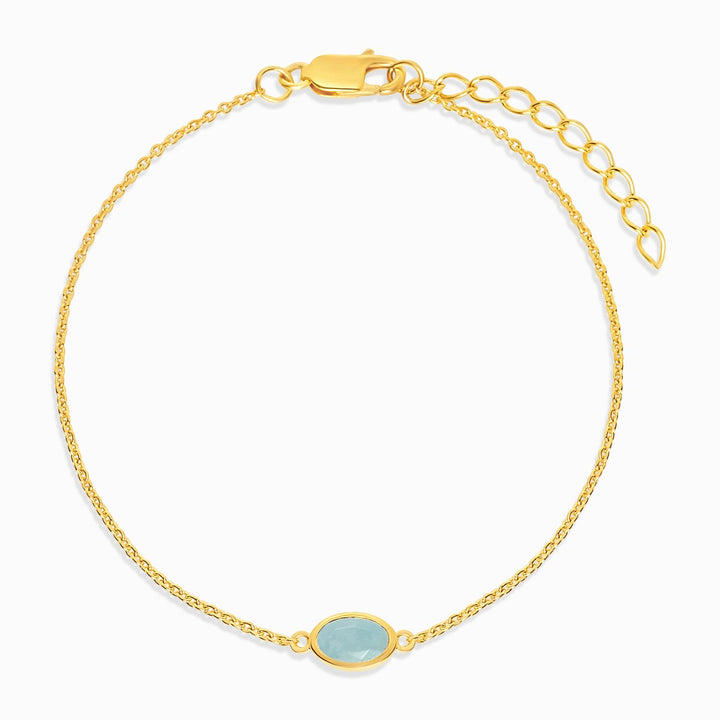 Gouden armband met March's geboortesteen Aquamarijn, deze heeft een blauwe kleur. Kristallen armband met blauwe kristal Aquamarijn in goud.