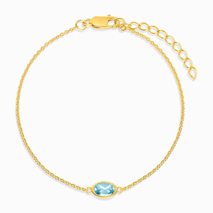 December geboortesteen armband in goud met blauwe topaas. Kristallen armband met blauwe Topaas in goud.