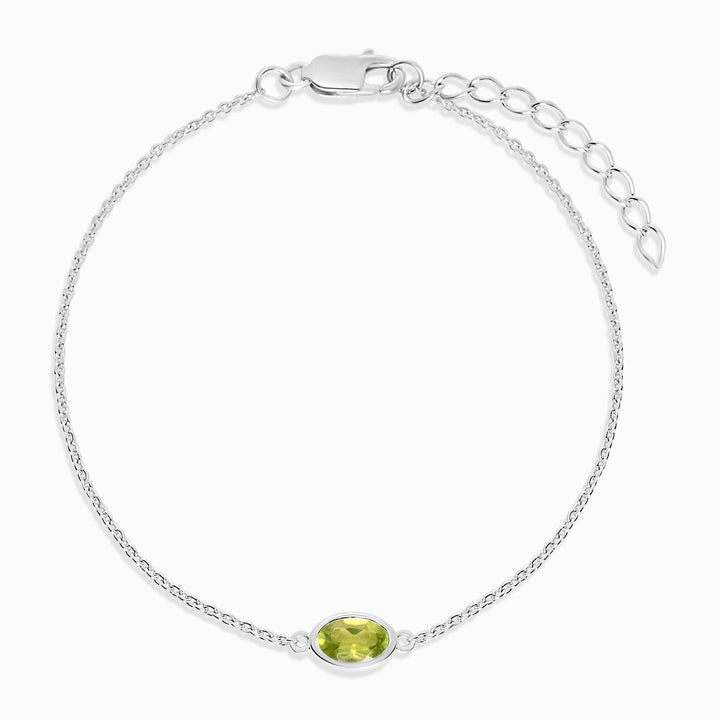 Kristallen armband met groene Peridot edelsteen. Zilveren armband met groene steen Peridoot.