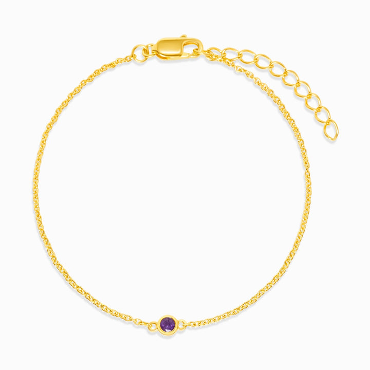 Gouden armband met paarse Amethist, de geboortesteen van februari. Sieraden met Amethist kristal om als armband in goud te dragen.