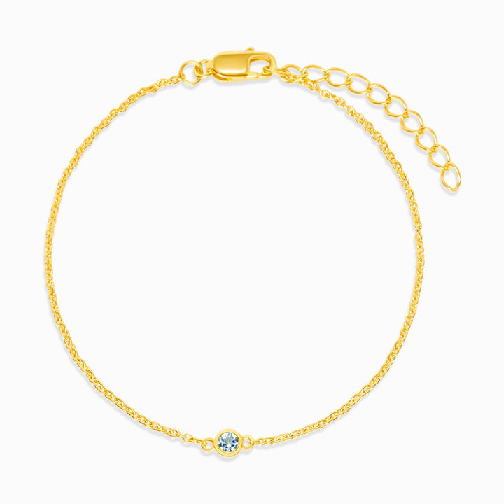 Blauw Topaas sieraden om als armband te dragen. Kristallen armband met Blauwe Topaas in goud.