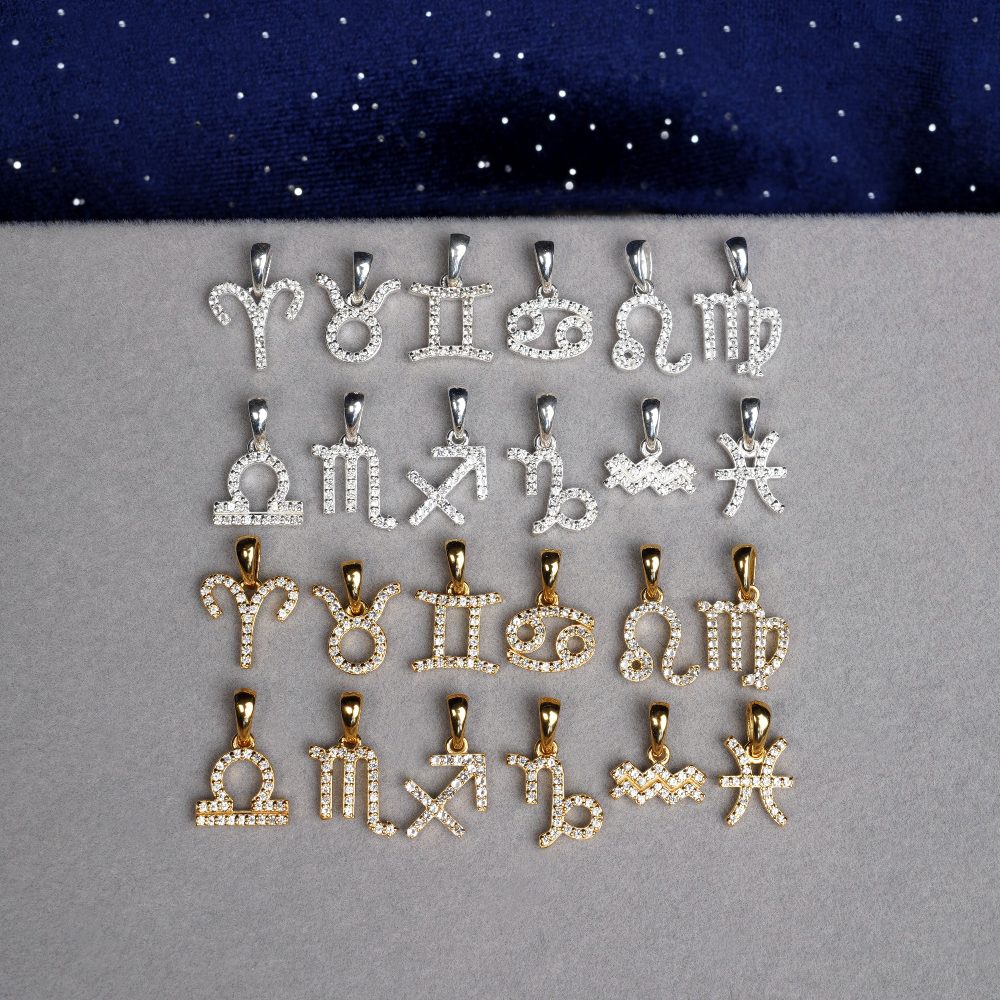 Dierenriem sieraden collectie. Edelsteenhangers met sterrenbeelden in zilver en goud.